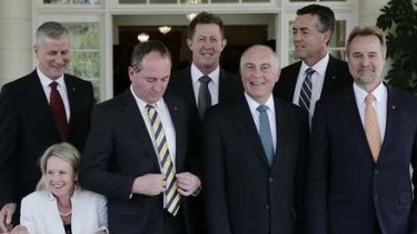 Nationals MPs pose for photos afer the swearing in ceremony at Government House in Canberra on Wednesday.
