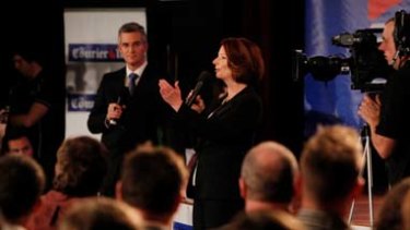 Julia Gillard addresses the crowd at the Broncos Leagues Club in Brisbane where both leaders took voters questions.
