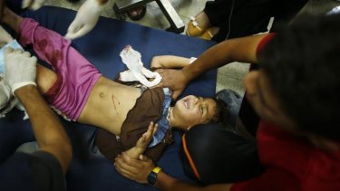 A Palestinian girl is treated in a hospital in northern Gaza.