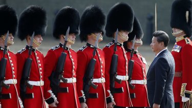 Chinese President Xi Jinping inspects a guard of honour at Horse Guards Parade in London on Tuesday.