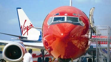 All aboard ... Virgin has helped over 20,000 Qantas passengers.