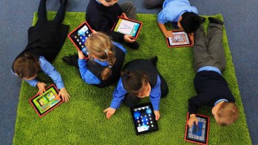 iPads and screen-based technology are used in schools as well as the home.