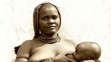 Taken down ... A Himba woman breastfeeds her baby.