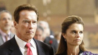 Arnold Schwarzenegger and his wife Maria Shriver pictured at a funeral late last year.
