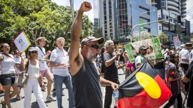Demonstrators protest in the Brisbane CBD.