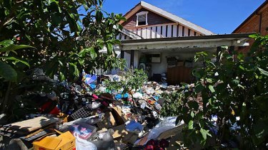Rubbish litters the yard of the Bondi home.