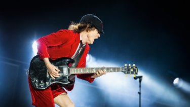 Angus Young of AC/DC: A generation of retired musicians has been forced to pick up their instruments and go back on tour.
