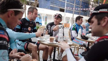 The spirit is wheeling ... members of the Manly Warringah Cycling Club bond over coffee.