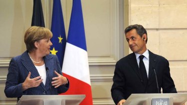 "We want to express our absolute will to protect the Euro" ... France's president Nicholas Sarkozy and Germany's chancellor, Angela Merkel.