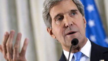 Was it a gaffe? US Secretary of State John Kerry speaks to the media at the US embassy in Paris on Sunday.  In London, he seemed to offer Syria a way to avoid being attacked.