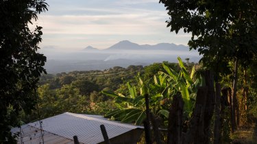 Some of El Salvador's 23 volcanoes overlooking the lush agricultural lowlands: living beneath volcanoes gives locals an appreciation of life, says Dr Ramon Garcia-Trabanino.