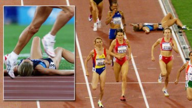 Fall from grace ...Suzy Favor Hamilton lies on the track after taking a tumble in the final of the Women's 1500-metre event at the Sydney 2000 Olympics.
