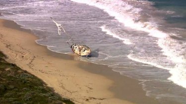 The stricken yacht, after it washed up on shore.