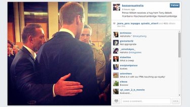 <i>Harper's Bazaar</i> Australia posted a photo on Instagram of Tony Abbott escorting Prince William today, breaking protocol and touching his back.