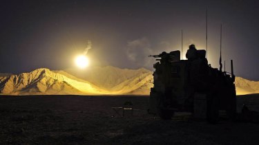 An Afghan Artillery illumination round lights an Australian position in the West Dorafshan region of Uruzgan province in 2010.