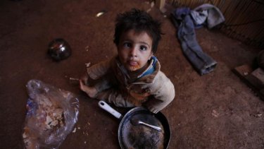A child in Syria where sabotage is feared surrounding an international effort to prevent a measles outbreak.