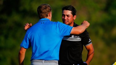 New order: Jordan Spieth congratulates Jason Day after his three-stroke victory in the PGA Championship.