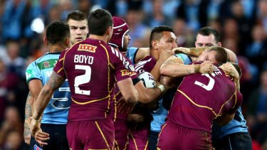 Boilover: Tempers flare as the Blues and Maroons square up during Origin II.