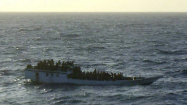 A packed asylum-seeker boat in distress earlier this year.