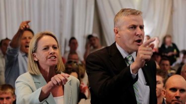 Listen to us ... Senator Fiona Nash and the Member for the Riverina, Michael McCormack, part of the hostile crowd.