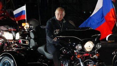 Loves his nationalist bikies ... Russia's Vladimir Putin rides a motorcycle on August 29, 2011 at a biker's festival in the Black Sea port of Novorossiysk, Russia. 