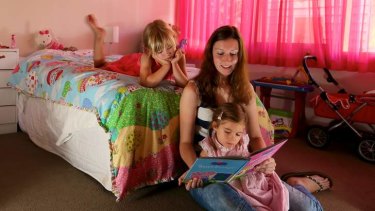 One of a rising number of live-in nannies, German au pair Christine vom Heede, looks after Stella, 5, and Phoebe, 3.