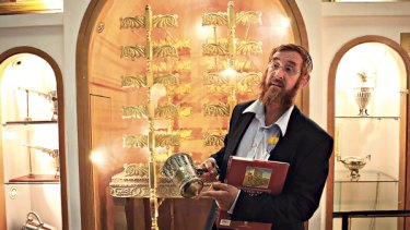 Ready ... Yehuda Glick, the director of the Temple Institute, holds a sacred vessel specially made for the Messiah's coming.