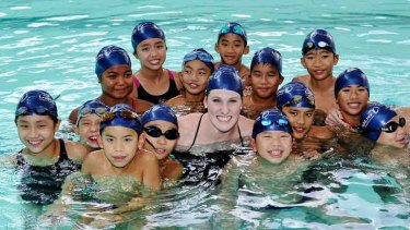 US swim star Missy Franklin conducts a clinic with Malaysian children.
