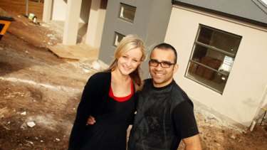 Susan and Reyan Fernando in front of their dream home in outer Geelong's Highton estate: "It was our goal in life to have a place of our own."