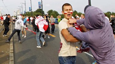 Ouch ... fans take each other on near the stadium.