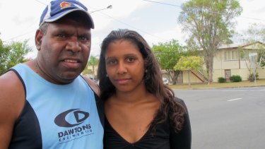 Tim Briggs and his yougest daughter Tagan, 18, prepare to leave their Woodridge home.