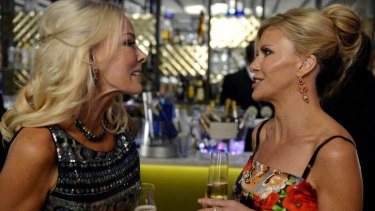 Snitching and bitching: Janet Roach and Gamble Breaux have champagne flutes poised for <i>The Real Housewives Of Melbourne</i>.