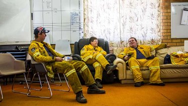 Guarded moment &#8230; Bungendore firefighters take some much-needed time out. Heatwave conditions are set to resume.