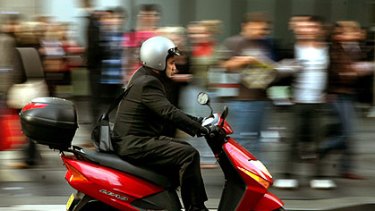 State MP Aidan McLindon wants dedicated lanes for moped riders along Brisbane’s main roads.