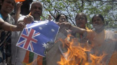Activists of India's main opposition Hindu-nationalist Bharatiya Janata Party  burn Australia's national flag during a protest in  Hyderabad at the weekend.