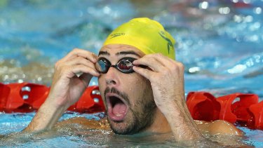 Australian swimmer Christian Sprenger adjusts his goggles during a training session in Glasgow on Monday.