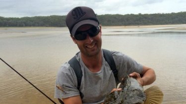 Good catch: Liam Curtis with a 92-centimetre flathead caught at Lake Conjola.