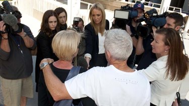 'We can't give up' ... The aunt of the Italian sisters involved in an international custody dispute speaks to the media outside the Family Court in Brisbane.