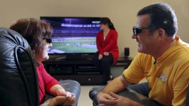 Reality TV . . . the Paragalli family from Green Valley had to share two pairs of glasses to watch last night's friendly between Australia and New Zealand.
