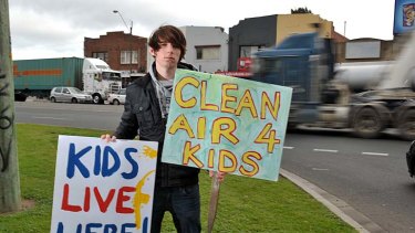 Noah Lautman-Wurt, on the corner Williamstown Road and Francis Street, protesting truck noise.