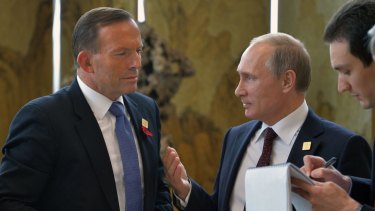 Tony Abbott and Vladimir Putin at the APEC meeting in Beijing in 2014. 