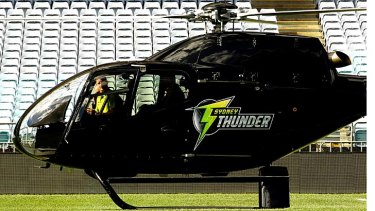 As Australia was digesting the fact that its national team had been handed a 347-run drubbing by England, Cricket Australia was busy flying in Michael Hussey by helicopter to Sydney on Monday, to announce he would be playing for Sydney Thunder in the Big Bash tournament.