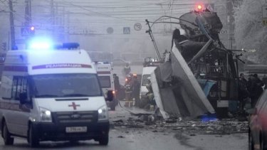 Emergency services respond to a blast on a trolleybus in Volgograd on Monday which killed at least 10 people.