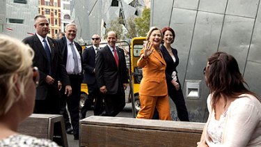 Matters of state: Hillary Clinton and Julia Gillard walk through Federation Square on their way to lunch.