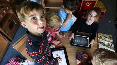 Stimulating creativity: KU Killara Park preschoolers use educational apps on the school's iPads.