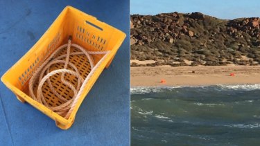 Orange crates, believed to be from 'Returner', the trawling vessel missing off the coast of WA, found at nearby Dolphin Island.