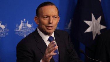 Tony Abbott confirms he personally told News Corp columnist Andrew Bolt  about the dumping of changes to race-hate laws.