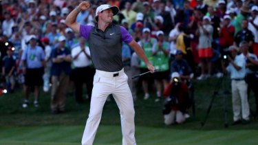 Simply irresistable: Rory McIlroy celebrates his one-shot victory.