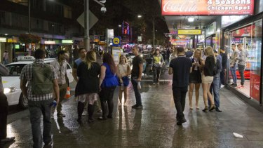 Homeward bound: partygoers fill the streets of Kings Cross on the first weekend of new lockout laws