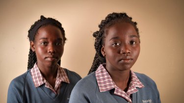 Tahbisa (right) says braiding makes her hair healthier and easier to manage.